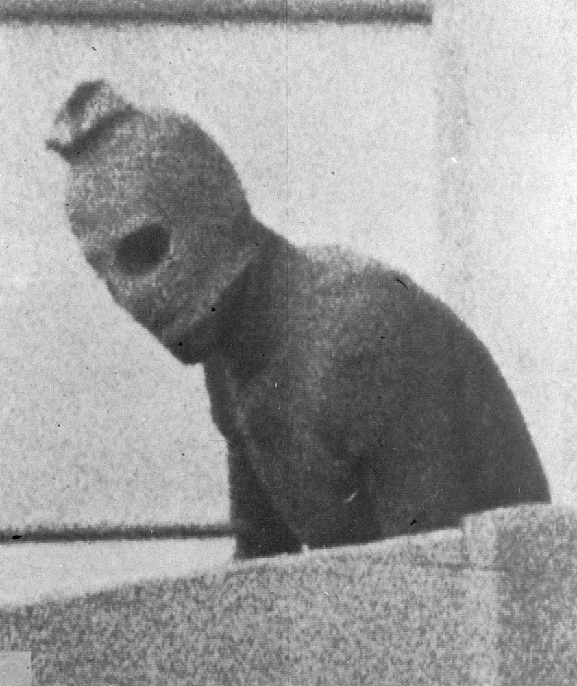 A Palestinian terrorist wearing a balaclava looks over the balcony of the Israeli team quarters at Building 31 of the Munich Olympic Village. During the 1972 Summer Olympics in Munich, a Palestinian terrorist group, known as Black September, took the Israeli Olympic team hostage and eventually killed 11 Israeli athletes. In photos: Olympic Games over the years