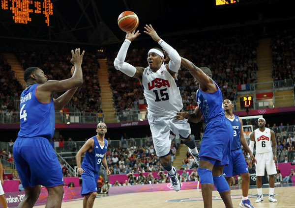 Kevin Durant scored 22 points in his Olympic debut to help the United States men's basketball team take a 98-71 opening win over France on Sunday. A dominant but not dream start for US team