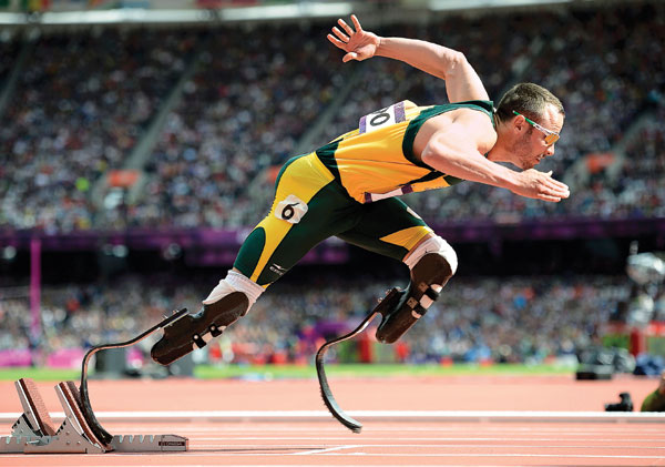 South Africa's Oscar Pistorius competes in a men's 400m heat in the Olympic Stadium at the London Olympic Games on Saturday. Pistorius advanced into semfinals. Daniel Ochoa De Olza / Associated Press Pistorius makes history