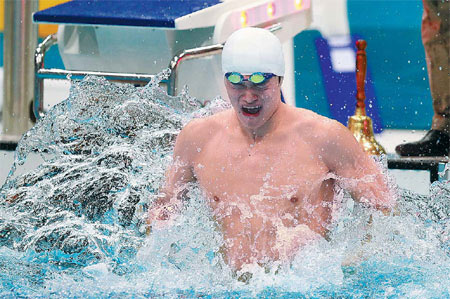 China's Sun Yang reacts after he wins gold in the men's 1,500m freestyle final in world record time at the Aquatics Center of the London Olympic Games on Saturday. Sun clocked 14 minutes, 31.02 seconds. 'This is the event I most wanted to win, and all my effort paid off at this moment,' he said. Cui Meng / China Daily It's not doping that wins races, Sun says