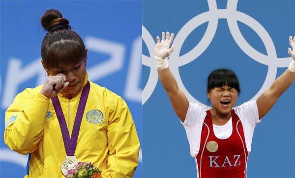 Gold medal winning weightlifters Maiya Maneza (left) and Zulfiya Chinshanlo of Kazakhstan are both originally from China. Hassan Ammar / Associated Press Bringing it home? Nope
