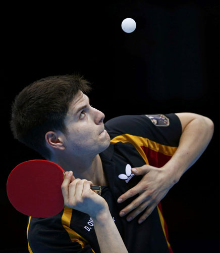 Germany's Dimitrij Ovtcharov serves to China's Ma Long in their men's team semifinals table tennis match at the ExCel venue during the London 2012 Olympic Games August 6, 2012. <STRONG>Table tennis</STRONG>: Rivals look to Rio to beat China
