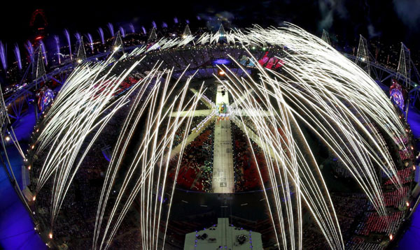 Fireworks explode over the Olympic Stadium during the closing ceremony of the London 2012 Olympic Games August 12, 2012. Games over, time to party