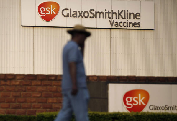 A man walks in front of a GlaxoSmithKline factory at Pudong district in Shanghai July 11, 2013. GSK replaces China chief amid scandal