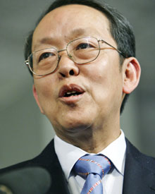 Chinese Ambassador to the United Nations, Wang Guangya speaks to the media after the Security Council meeting on Resolution 1540 dealing with non-proliferation of weapons of mass destruction, at the United Nations Headquarters in New York, April 27, 2006.