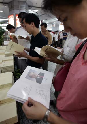 Customers browse the newly released book titled