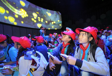 Children walk out of mountain for Expo