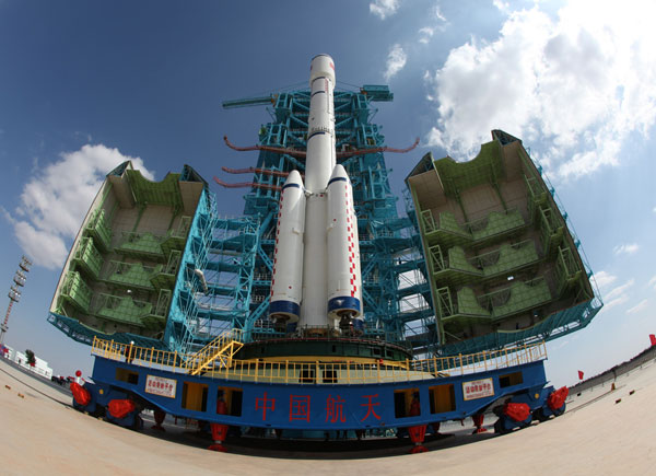 A Long March II-F carrier rocket loaded with 'Tiangong-1', an unmanned space module, stands on the launch pad at Jiuquan Satellite Launch Center, Sept 20, 2011. Countdown to China's space station begins