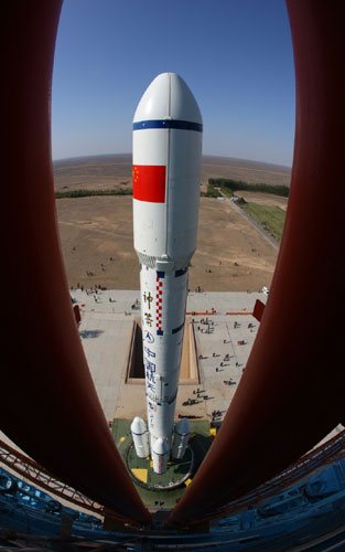 A Long March II-F carrier rocket loaded with 'Tiangong-1', an unmanned space module, stands on the launch pad at Jiuquan Satellite Launch Center, Sept 20, 2011. Countdown to China's space station begins