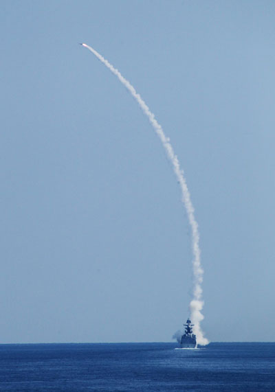 A missile frigate launches a ship-to-air missile to intercept an enemy target on Sept 5, 2012. Proud decade for China's Army