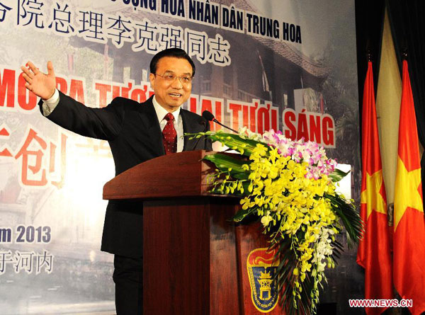 Premier Li Keqiang speaks during an exchange with representatives of youth from both China and Vietnam at Vietnam National University, Hanoi, in Hanoi, Vietnam, Oct 15, 2013. Youth encouraged to expand relations
