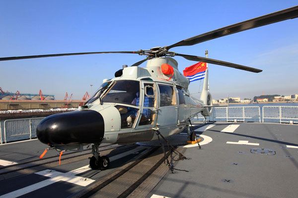 A shipboard helicopter in charge of patrol, maritime rescue and antisubmarine operation will take part in the visits following the North China Sea Fleet, Aug 20, 2013. Chinese navy to visit US, New Zealand, Australia