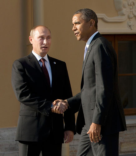 U.S. President Barack Obama (R) and Russia's President Vladimir Putin shake hands during arrivals for the G20 summit at the Konstantin Palace in St. Petersburg, September 5, 2013. Obama, Putin meet for G20 at St petersburg