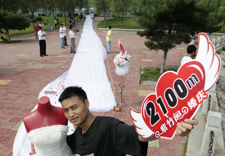 Man makes longest wedding dress train for bride