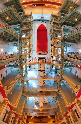 The Tiangong-1 space module is lowered onto the Long March II-F T1 rocket at the Jiuquan Satellite Launch Center in Gansu province on Sept 18. All systems go for key space launch
