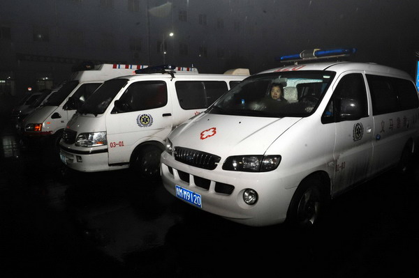Ambulances stand by outside the coal mine in Yima, Henan province, on Nov 4, 2011. 4 killed, 50 trapped in coal mine