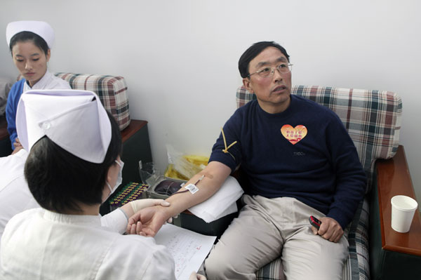 Worker honored as modern role model in China