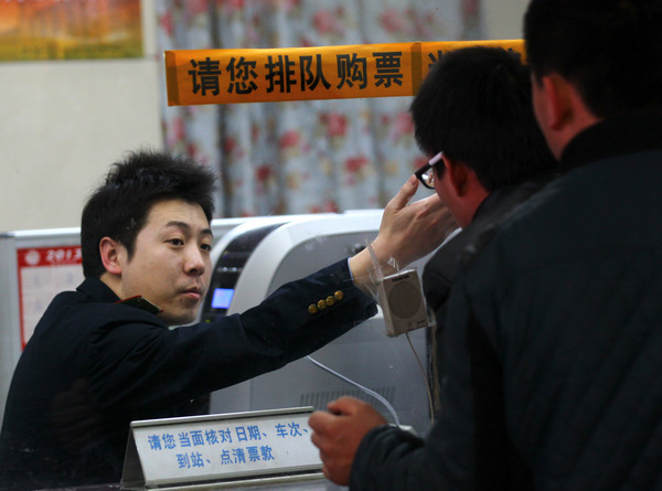 Li Tian, a ticket seller at Beijing Railway Station Rail ticket seller misses out on special dinner again