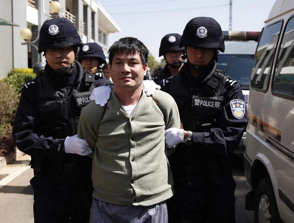 Myanmar drug lord Naw Kham is taken to be executed in Kunming, Southwest China's Yunnan province, March 1, 2013. Mekong River murderers executed by injection