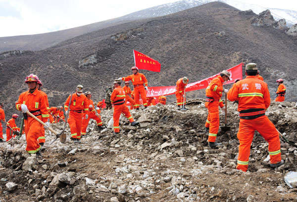 Rescue workers race round the clock at the accident site of a major landslide that hit a mining area in Maizhokunggar county of Lhasa, in Southwest China's Tibet autonomous region. Eighty-three people were reported missing. Hopes fading for mine landslide victims in Tibet