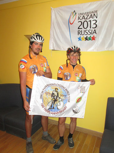 Alen Khairullin (left) and Pavel Grachev on their cycling world tour receive interview at Russian Federation Consulate General in Shenyang, the capital of Liaoning province on Monday. They depart the city for Harbin, the capital of Heilongjiang province bordering Russia on Tuesday morning. Bikers on world tour enjoying trek through China
