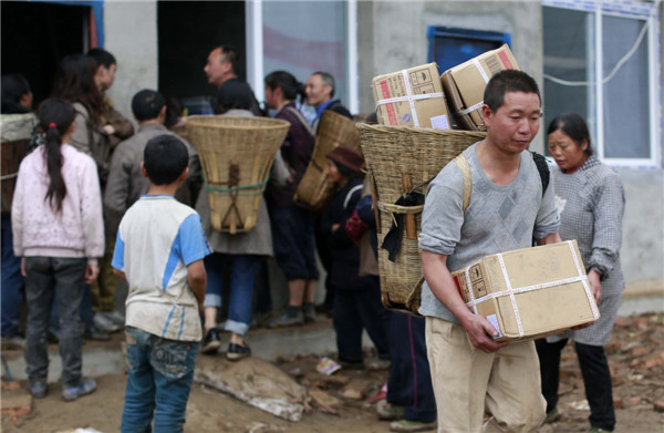 Relief supplies arrive at Fujiaying village in Lushan county, Sichuan province. Photos by Feng Yongbin / China Daily Disaster: Self help and survival