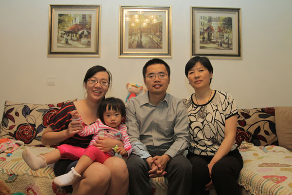 Han Lin, his wife Qian Jin (left), with their daughter and mother share happy times in their Beijing home. Feng Yongbin / China Daily The middle-class trap