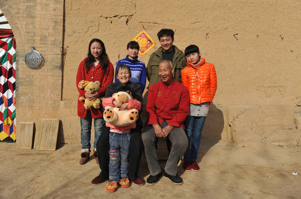 Doudou, a left-behind child, doesn't want to speak to other people on Jan 28, 2012 in Yuncheng, North China's Shanxi province. Five years for a left-behind child