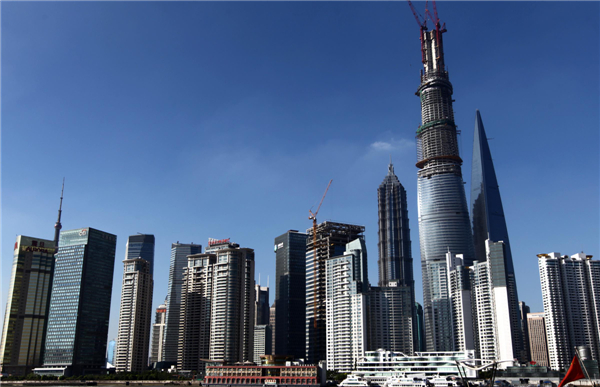 Shanghai Center, China's tallest building when it’s finished, dwarfs nearby skyscrapers China's tallest building to be finished by 2015