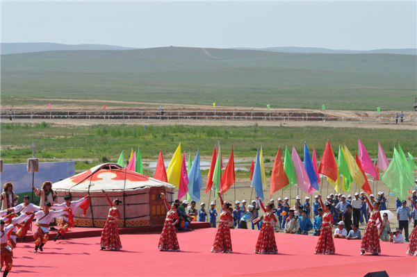 Dancers perform traditional Mongolian dancing at the opening ceremony of the 24th Tourism Naadam Festival Naadam Festival trots into town for wild games
