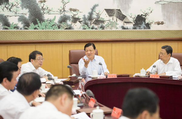 Liu Yunshan, center, a member of the Standing Committee of the Political Bureau of the Communist Party of China (CPC) Central Committee, speaks at a meeting on the supervision of the 'mass line' campaign in Beijing, Sept 13, 2013. Strict supervision urged for 'mass line' campaign