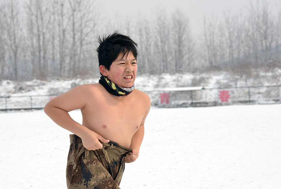Topless children in wintry cold raises online furor