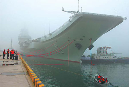 Carrier docks at Qingdao