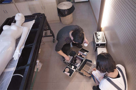 Mortuary workers try to offer comfort