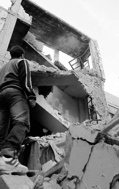 Syrian clash centers on rebel-held town Qusair