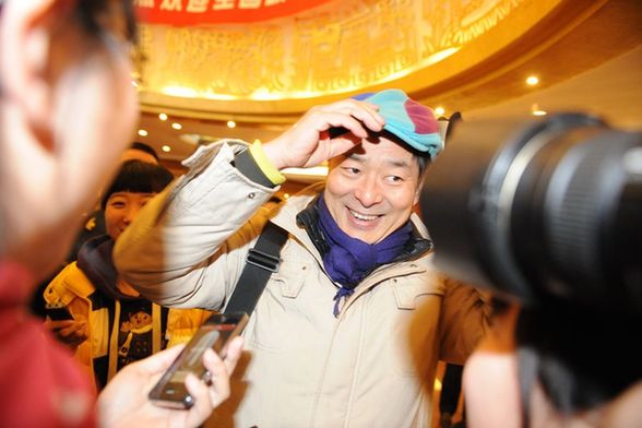 iPhone受寵！看看兩會記者的采訪工具