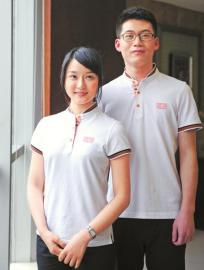 蜀繡熊貓領(lǐng)口藏 財富論壇志愿者裝亮相