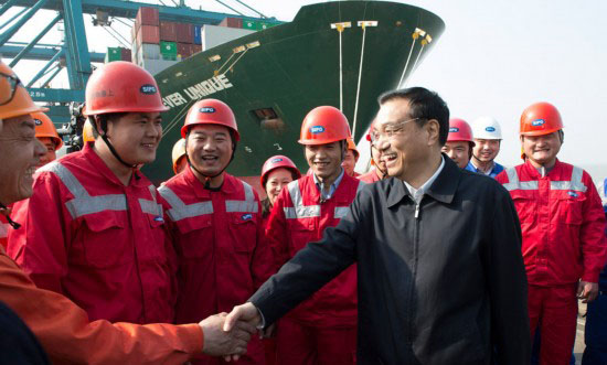 李克強在江蘇上?？疾? style=