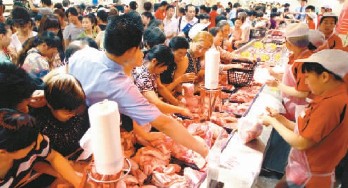 部分超市豬肉每斤最多降3元 肉價三問:拐點到了嗎