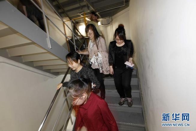 上海:“摩天高樓”的防災(zāi)綜合演練