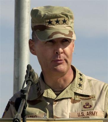 Lt. Gen. David Barno, the commander of the 18,000 mainly U.S. troops in Afghanistan, speaks Sunday, Nov. 21, 2004, in Paktika province, about 200 kilometers (120 miles) southwest of Kabul. Barno said that rebels including al-Qaida fighters were still slipping into the region from Pakistan. [AP]