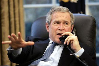 In this photo released by the White House, US President Bush talks with Palestinian president-elect Mahmoud Abbas, also know as Abu Mazen, from the Oval Office of the White House Monday, Jan. 10, 2005 in Washington. [AP]