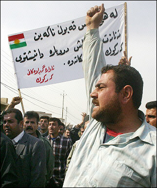 Kurds protest in the northern city of Kirkuk, demanding the return of their properties which were snatched away during the regime of Saddam Hussein (news - web sites). Iraq (news - web sites)'s new parliament will hold its first session in 10 days, more than a month after the country's historic vote.(AFP/Marwan Ibrahim) 