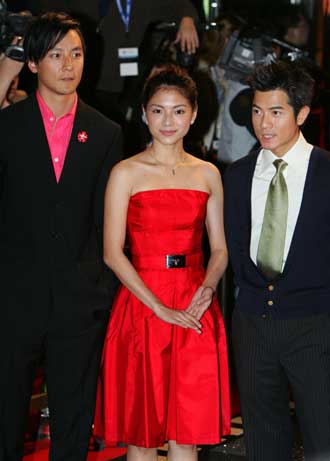American-Chinese actor Daniel Wu, Malaysian actress Angelica Lee and Hong Kong actor and singer Aaron Kwok attend the opening ceremony of "Entertainment Expo" in Hong Kong March 21, 2005.