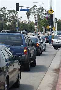 Cars are lined up at a inoperative traffic signal at an intersection in the Studio City section of Los Angeles as a power black out interrupted electrical service to many parts of the city September 12, 2005. Officials at the Los Angeles Department of Water and Power indicated one of their employees accidentally cut a power cable which lead to major power outage knocking out electricity to thousands of customers.