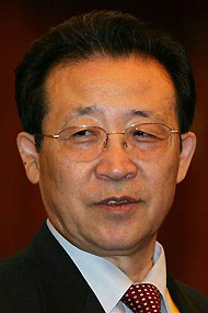 North Korea's Vice Foreign Minister Kim Kye Gwan waits before a banquet meeting hosted by China's Vice Foreign Minister Dai Bingguo for the six-party talk delegation in Beijing, Saturday, Sept 17, 2005.