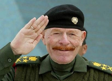 Izzat Ibrahim al-Douri is seen in his former position as chairman of the Revolutionary Command Council during a military celebration in Baghdad in this February 16, 2003 file photograph.