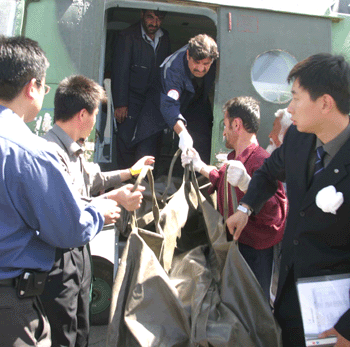 Slain workers identified; 2 suspects nabbed