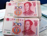 China widens yuan trading band