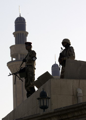 Iraqi soldiers on guard as sectarian violence broke out